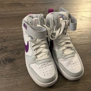 Kids size 4 Nike high tops, worn maybe 5 times. In excellent condition.